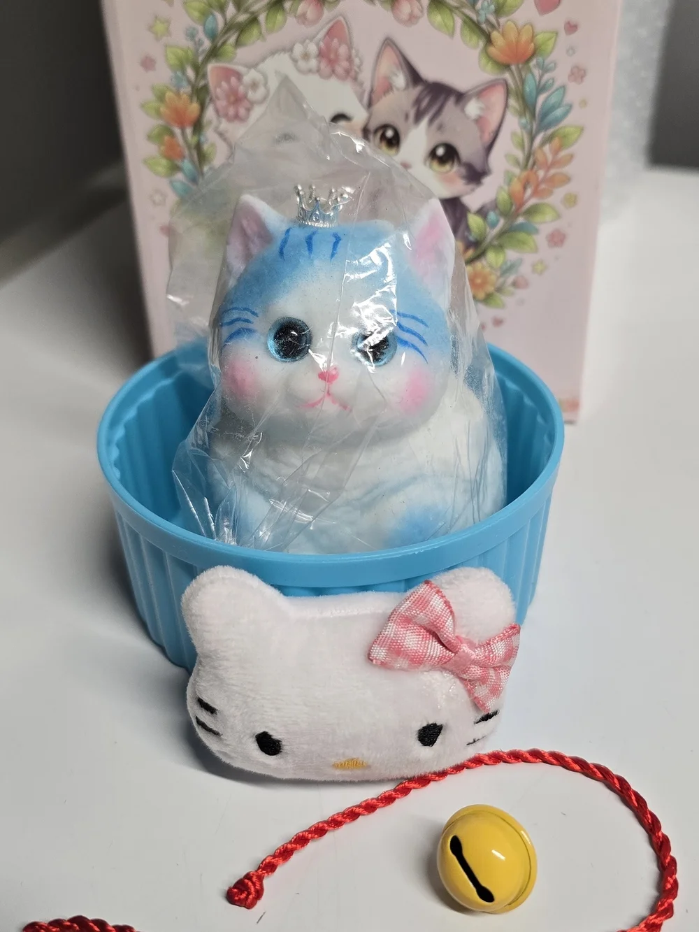 Blue & White Kitty Squishy with Crown in Blue Dish